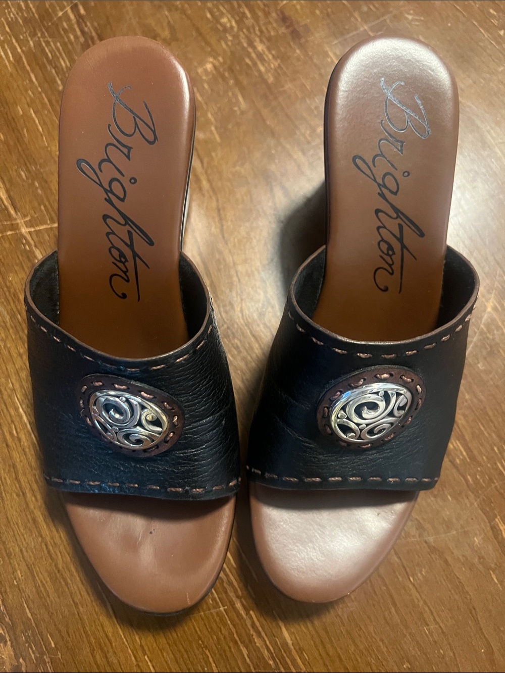Brighton Black Leather Slide Mules with Brown Footbed and Silver Medallion